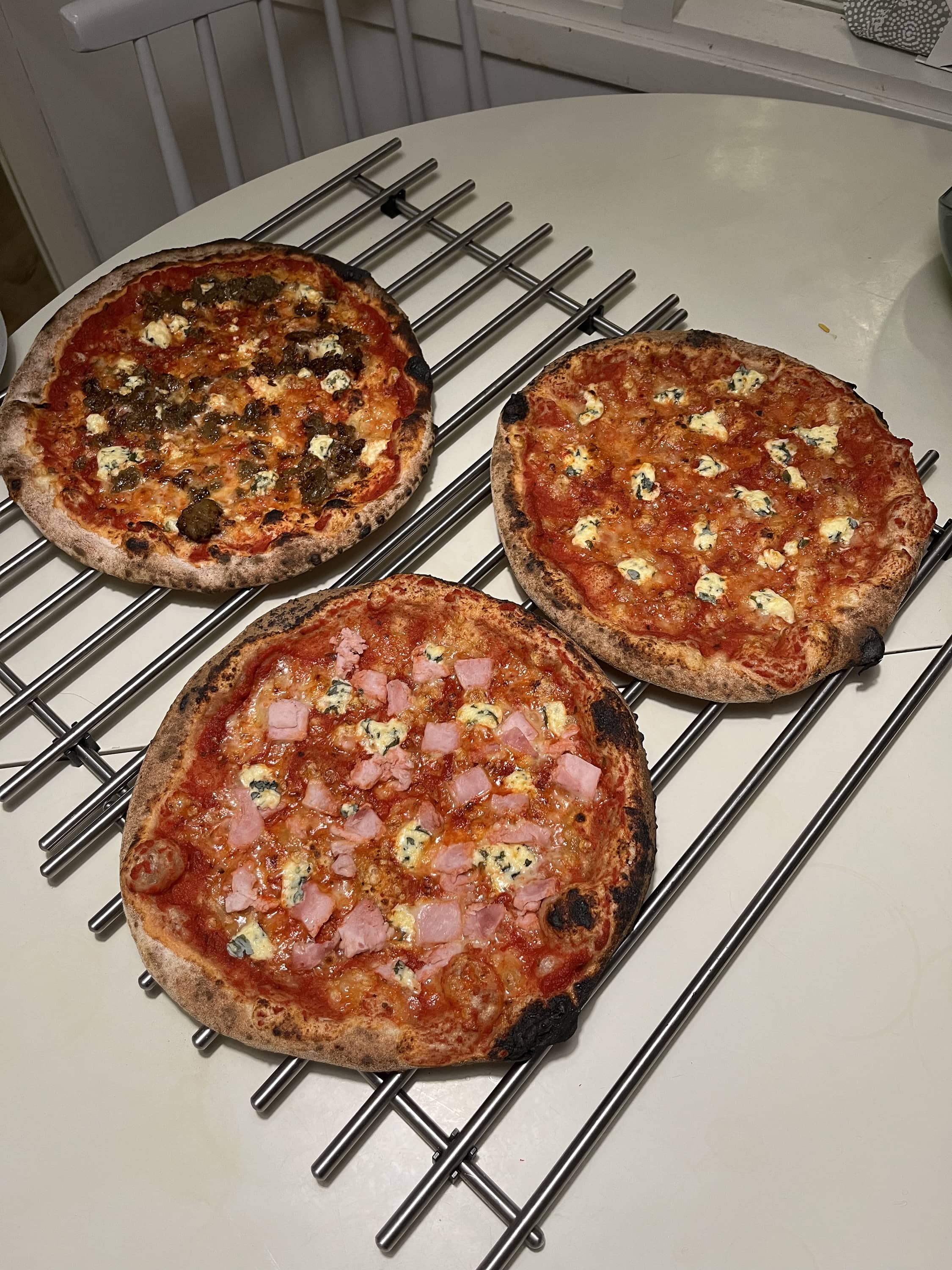 Three pizzas, done